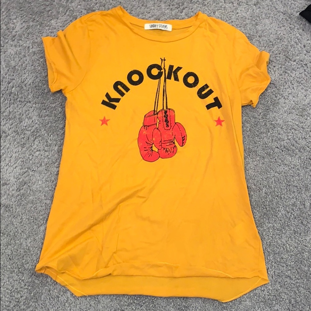 Sunday Stevens Mustard Yellow “Knockout” Tee